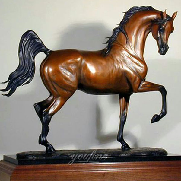 bronze outdoor statues of horses standing on a high horse